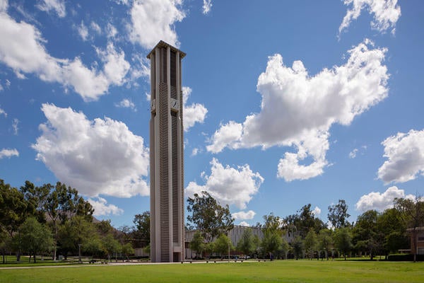 Bell Tower with blue sky and clouds (c) UCR/Stan Lim