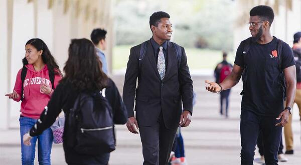 Students walking - Rivera Arches