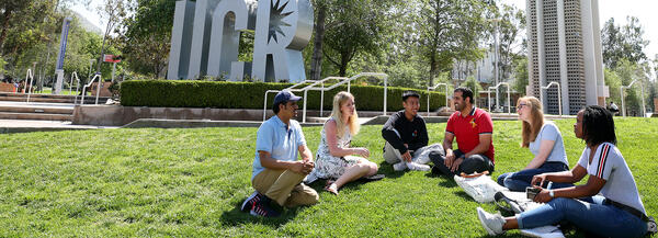 Students sitting on lawn