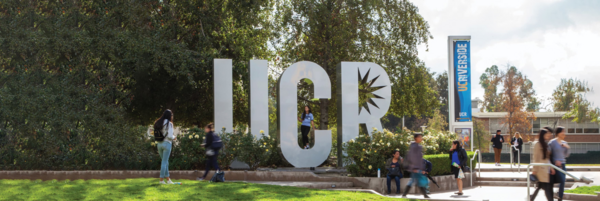 UCR sign with students 