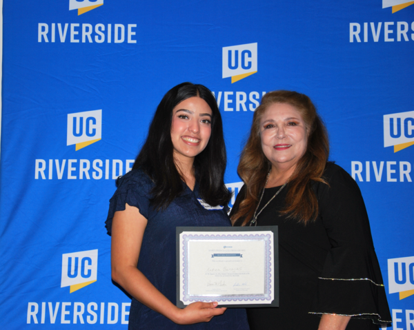 Maria Franco Gallardo Award Winner 2024 poses with certificate 