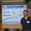 Student poses next to poster at 2024 MSRIP Symposium